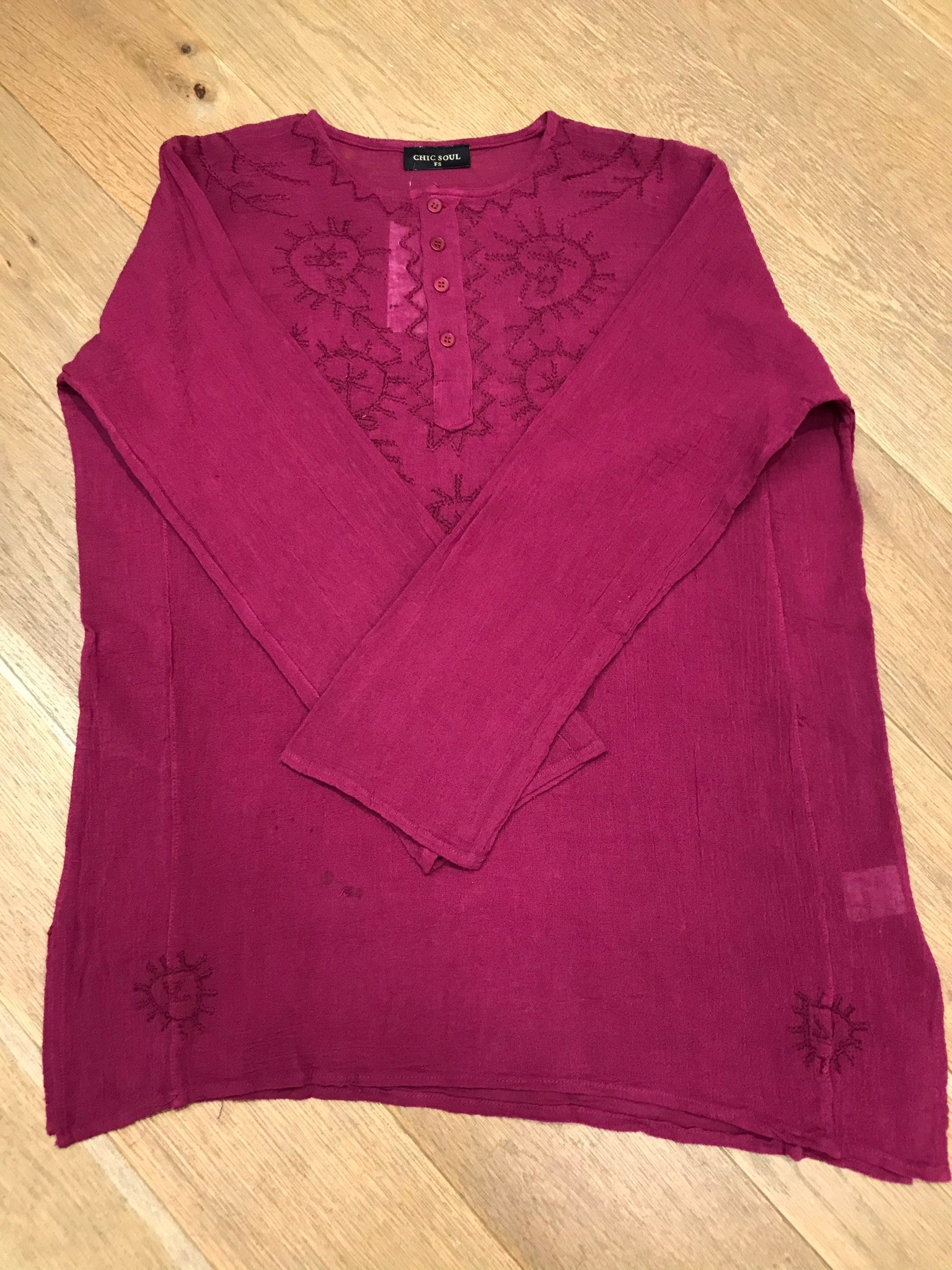 Long sleeves - wear rolled up when the weather's warm Round neck with button placket fastening Self coloured embroidery on the front & back Tie Dye - all slightly different due to hand dye techniques 100% Cotton crepe (cheesecloth) Actual measurements:- Chest approx 44-46”; Back length approx 27-28”; Underarm sleeve approx 17” Cool hand wash - dry out of direct sunlight