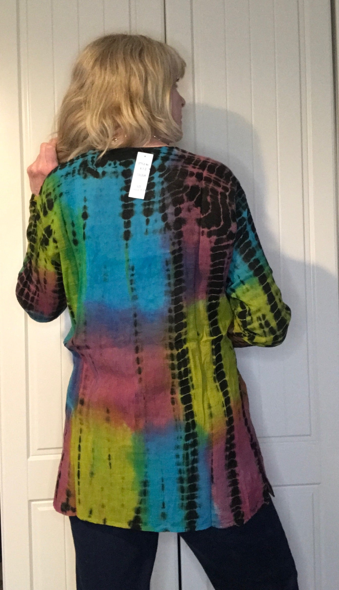 Long sleeves - wear rolled up when the weather's warm Round neck with button placket fastening Self coloured embroidery on the front & back Tie Dye - all slightly different due to hand dye techniques 100% Cotton crepe (cheesecloth) Actual measurements:- Chest approx 44-46”; Back length approx 27-28”; Underarm sleeve approx 17” Cool hand wash - dry out of direct sunlight