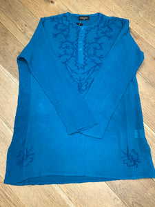 Long sleeves - wear rolled up when the weather's warm Round neck with button placket fastening Self coloured embroidery on the front & back Tie Dye - all slightly different due to hand dye techniques 100% Cotton crepe (cheesecloth) Actual measurements:- Chest approx 44-46”; Back length approx 27-28”; Underarm sleeve approx 17” Cool hand wash - dry out of direct sunlight