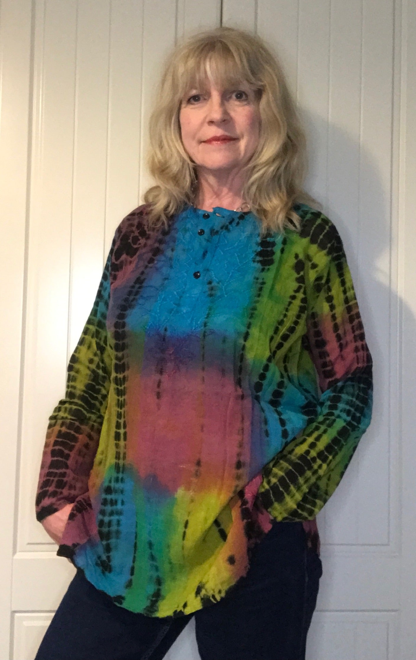 Long sleeves - wear rolled up when the weather's warm Round neck with button placket fastening Self coloured embroidery on the front & back Tie Dye - all slightly different due to hand dye techniques 100% Cotton crepe (cheesecloth) Actual measurements:- Chest approx 44-46”; Back length approx 27-28”; Underarm sleeve approx 17” Cool hand wash - dry out of direct sunlight