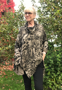 Fabulous cotton jersey tunic with a zig zag hem.   Cowl neck with drawstring Long sleeves Fits up to size 22 95% Cotton 5% Elastane 30 degree machine wash 3 colours - Hot Pink, Teal & Mocha