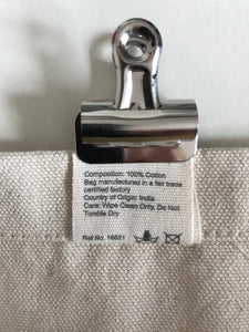 Composition: 100% Cotton.  Bag manufactured in a Fair Trade verified factory.  Country of Origin: India.  Care: Wipe Clean Only.  Do not tumble Dry.