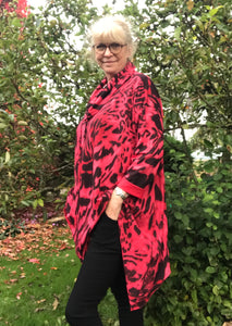 Fabulous cotton jersey tunic with a zig zag hem.   Cowl neck with drawstring Long sleeves Fits up to size 22 95% Cotton 5% Elastane 30 degree machine wash 3 colours - Hot Pink, Teal & Mocha