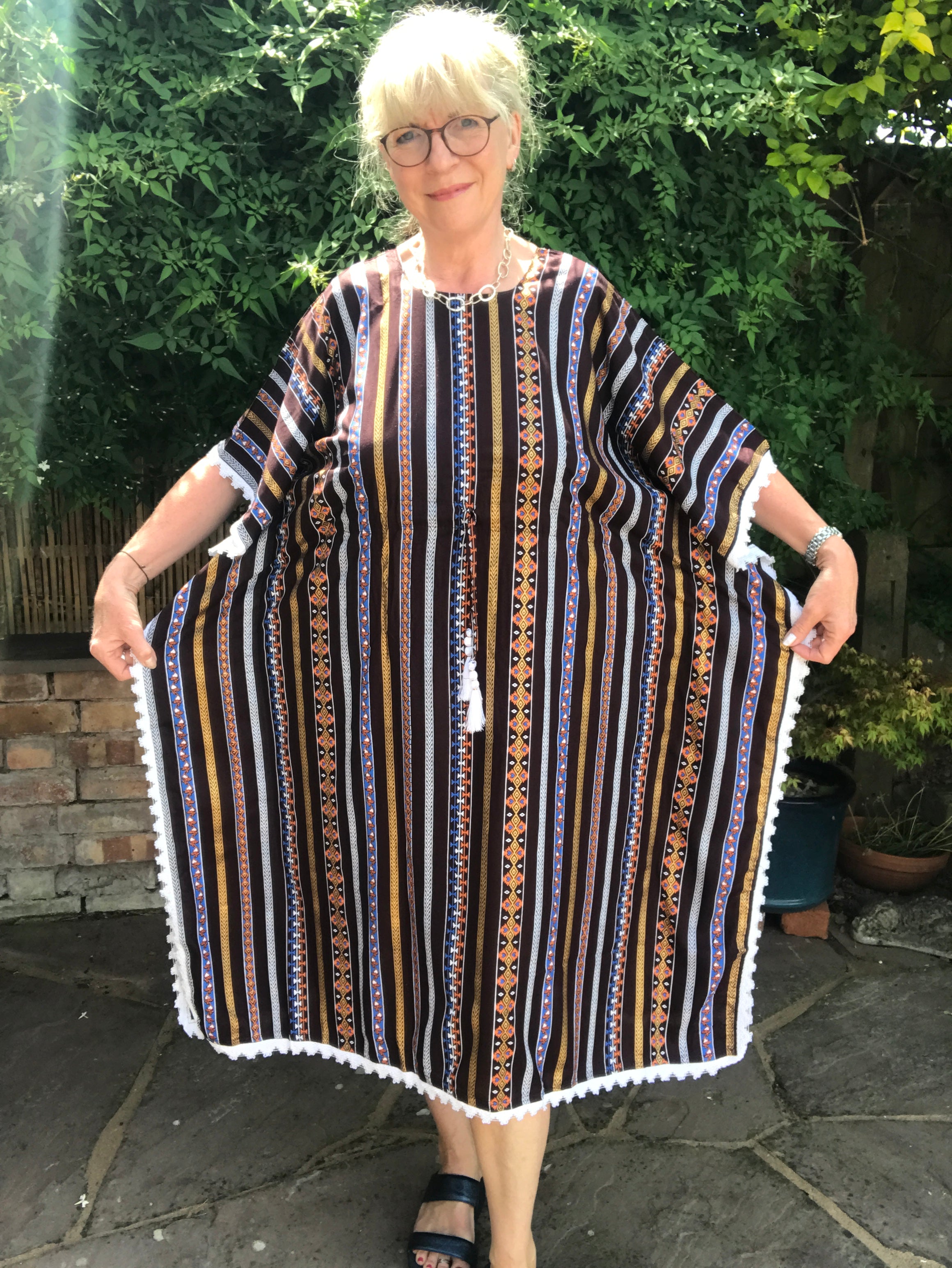 Cool kaftan for hot summer days and comfortable lounging.  One size - fits up to size 20 Back neck to hem length - 42" Comfortable cool viscose fabric  Four colourways Cool machine wash