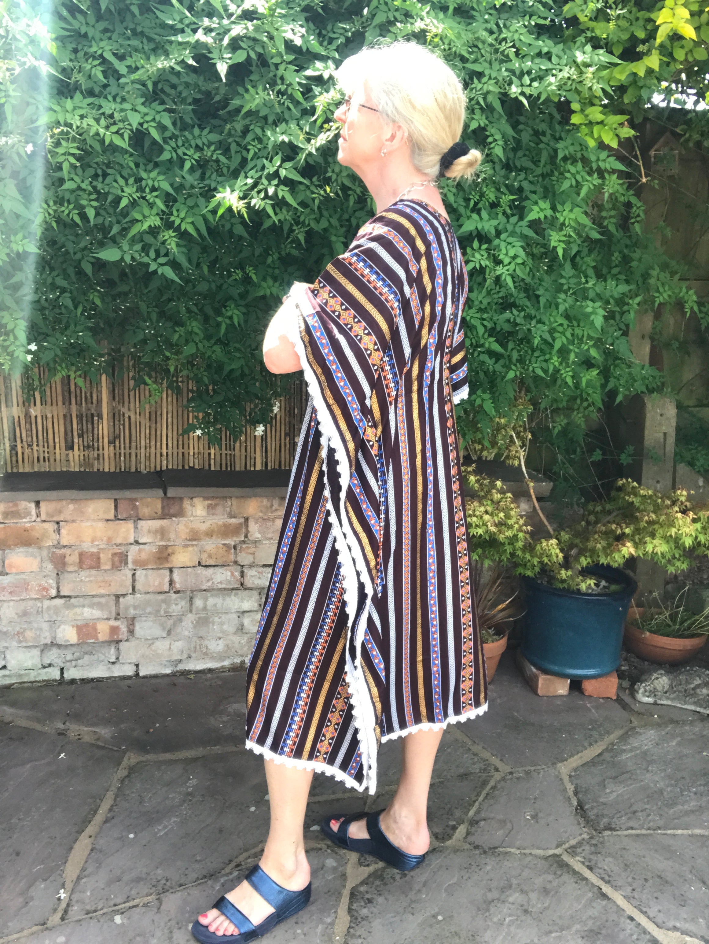 Cool kaftan for hot summer days and comfortable lounging.  One size - fits up to size 20 Back neck to hem length - 42" Comfortable cool viscose fabric  Four colourways Cool machine wash