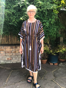 Cool kaftan for hot summer days and comfortable lounging.  One size - fits up to size 20 Back neck to hem length - 42" Comfortable cool viscose fabric  Four colourways Cool machine wash